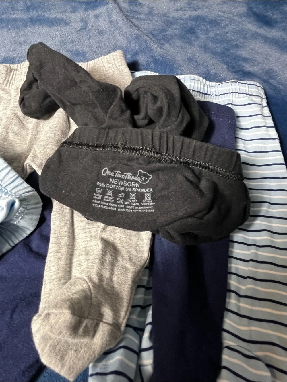 Newborn shirts and pants  9 pc bundle.  3 tops & 6 footed pants